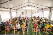 Crisis-affected and displaced children attend an e-learning session at the UNICEF-supported Makanna at El Gox displacement gathering point in Kosti, White Nile state.