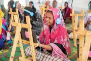Crisis-affected and displaced children attend an e-learning session at the UNICEF-supported Makanna at El Gox displacement gathering point in Kosti, White Nile state.