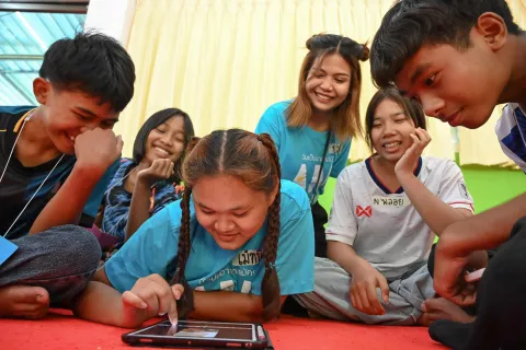 students using a tablet