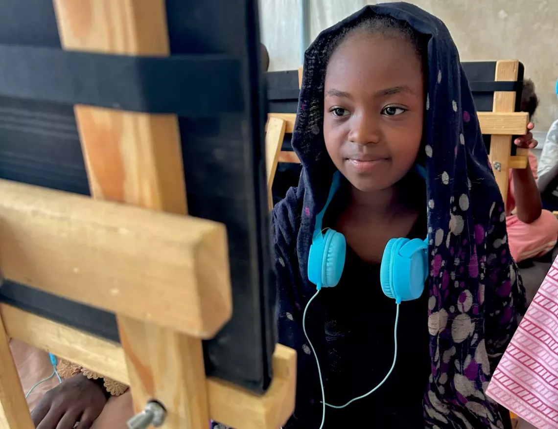 12-year-old Roaa enjoys using the Learning Passport daily in Abdu-Shamal internally displaced (IDP) camp, Port Sudan. &ldquo;I love reading and playing with my friends!&rdquo;