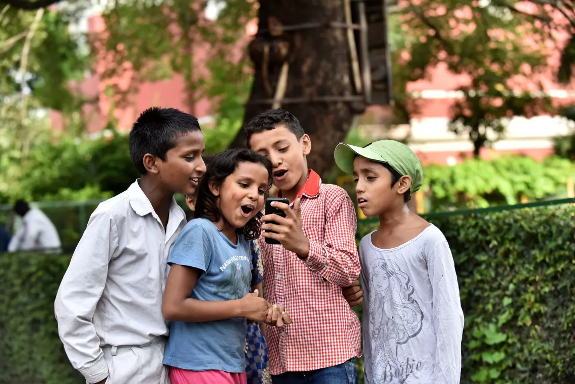 Children from slums and mobile phone use, at St. Columba’s School, Delhi