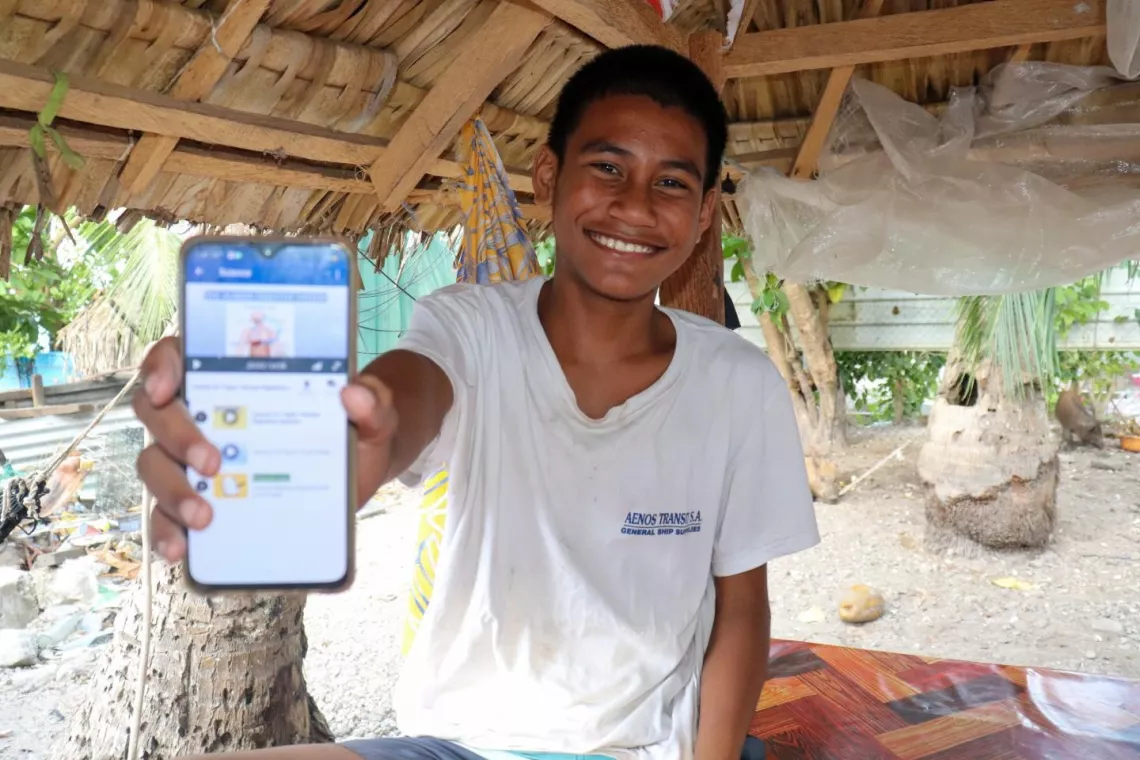 welve-year-old student Betangnga from Bikinibeu village in South Tarawa uses the Learning Passport to help him continue studying. 